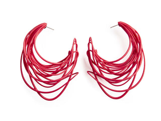Pair of red hoop earrings on a white background