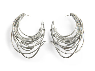 Pair of silver hoop earrings on a white background