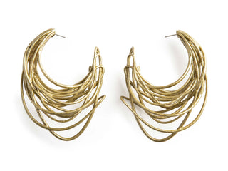 Pair of gold hoop earrings on a white background