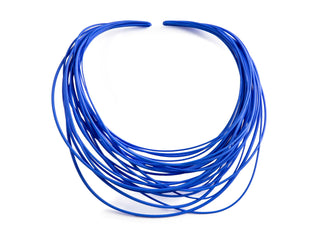 Blue necklace with multiple loops on a white background