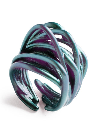Woven ring with purple and green colors on a white background
