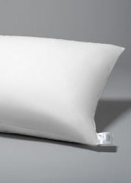White pillow on a gray background