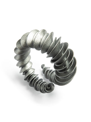 A metallic spiral cuff ring with a textured, ribbed design, shown on a clean white background.