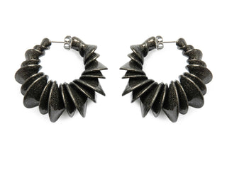 Pair of gunmetal spiral hoop earrings on a white background