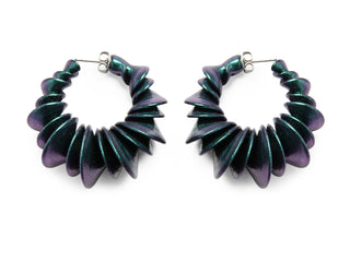 Pair of purple and green hoop earrings on a white background