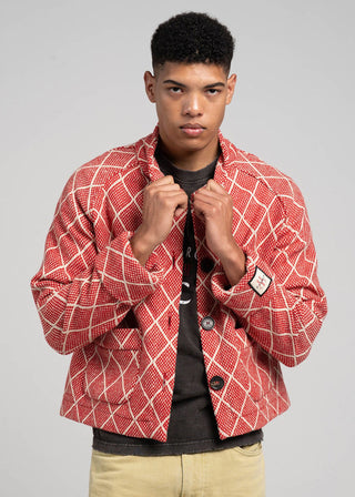 Man wearing a big diamond jacket.