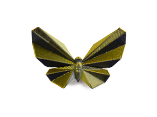 Butterfly-shaped object with black and gold stripes on a white background