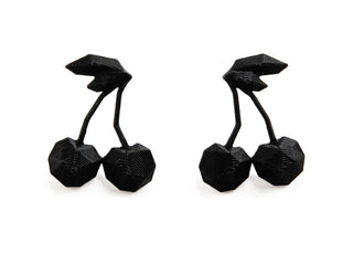 Black 3D-printed earrings on a white background