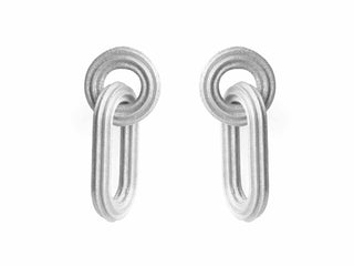 Pair of 3d printed silver earrings with a unique design