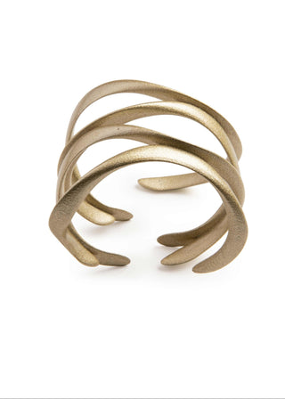 Gold bracelet with multiple curved links on a white background