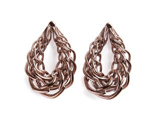 Pair of braided earrings on a white background