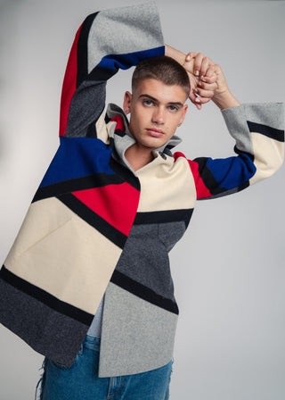 Handcrafted hooded Burel coat made from premium wool. Unique puzzle-cut design, artisan-sewn, sustainable fashion, and timeless style.