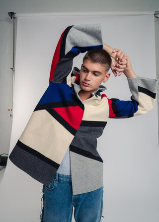 Handcrafted hooded Burel coat made from premium wool. Unique puzzle-cut design, artisan-sewn, sustainable fashion, and timeless style.