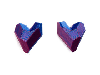 Pair of blue and red 3D-printed earrings on a white background