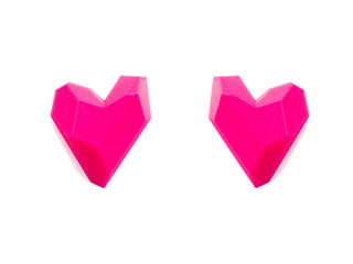 Pink heart-shaped objects on a white background