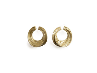 Pair of gold hoop earrings on a white background