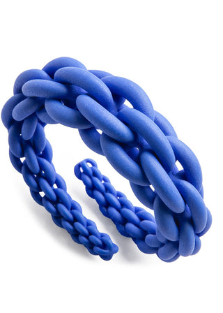Blue braided 3D-printed bracelet on a white background