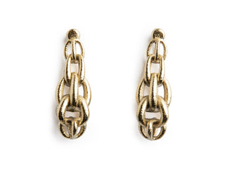 Gold chain 3D printed earring worn by a person with dark hair.