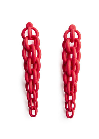 Pair of red chain-style earrings on a white background