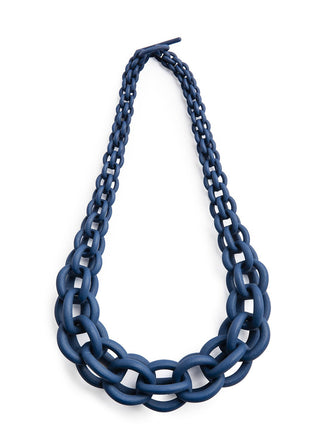 Blue chain necklace on a white background