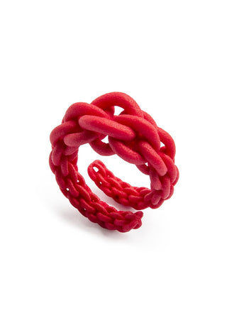 Red knotted ring on a white background