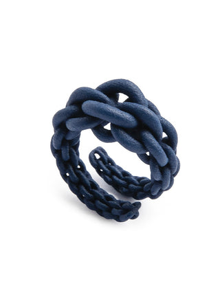 Navy blue knotted ring on a white background