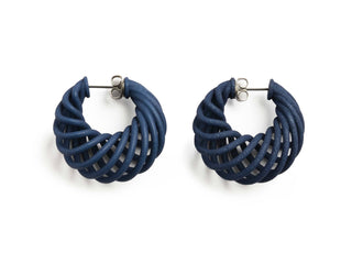 Pair of blue hoop earrings on a white background