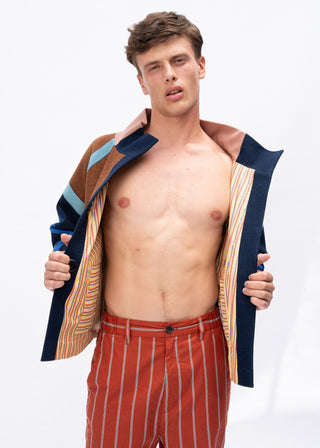 Man wearing a multi-color jacket 