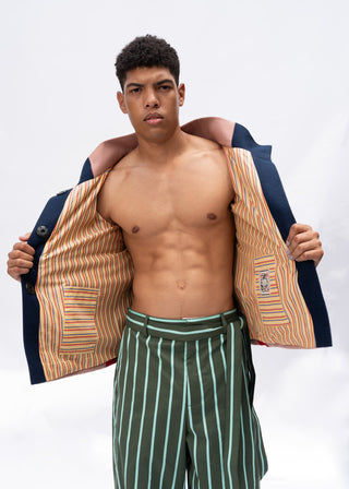 Man wearing a wool jacket with a white background