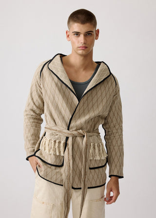 Unisex artist jacket in premium cotton with a bold beige diamond design and black finished edges.