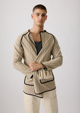 Unisex artist jacket in premium cotton with a bold beige diamond design and black finished edges.