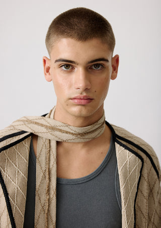 Unisex artist jacket in premium cotton with a bold beige diamond design and black finished edges.