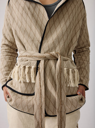 Unisex artist jacket in premium cotton with a bold beige diamond design and black finished edges.