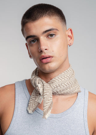 Unisex bandana in premium ultralight cotton with a bold beige and ecru duo-color design. Versatile styling accessory can be used to cover the hair, around the neck or even wrapped around the wrist as a bracelet.