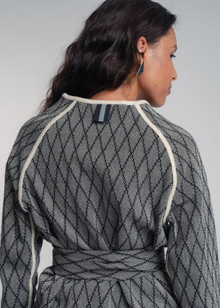 Unisex artist jacket belt in premium cotton with a bold black diamond design and ecru finished edges.