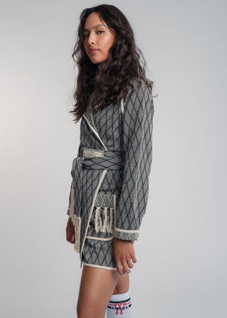 Unisex artist jacket in premium cotton with a bold black diamond design and ecru finished edges.