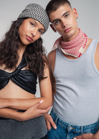 Unisex bandana in premium ultralight cotton with a bold black and ecru duo-color design. Versatile styling accessory can be used to cover the hair, around the neck or even wrapped around the wrist as a bracelet.