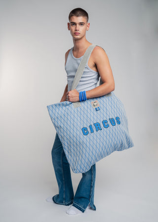 Oversized blue colored carryall made from durable all natural 4 ply cotton. Perfect for everyday shopping or weekend getaways this bag will help you organize everything.