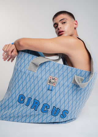 Oversized blue colored carryall made from durable all natural 4 ply cotton. Perfect for everyday shopping or weekend getaways this bag will help you organize everything.