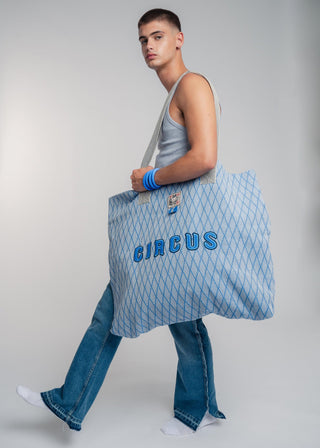 Oversized blue colored carryall made from durable all natural 4 ply cotton. Perfect for everyday shopping or weekend getaways this bag will help you organize everything.