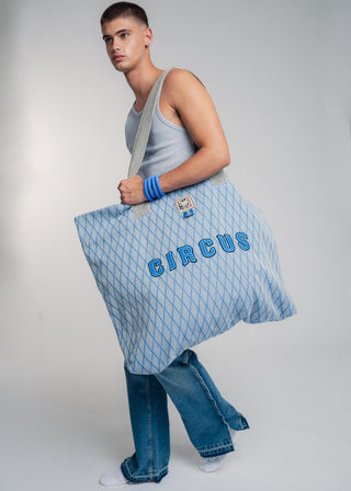 Oversized blue colored carryall made from durable all natural 4 ply cotton. Perfect for everyday shopping or weekend getaways this bag will help you organize everything.