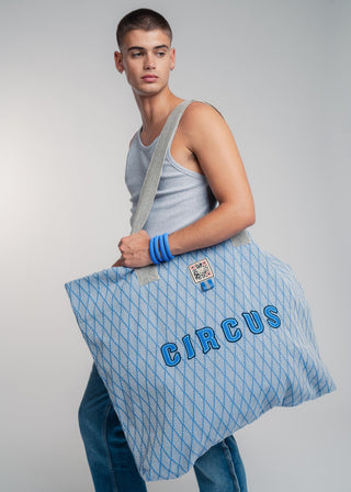 Oversized blue colored carryall made from durable all natural 4 ply cotton. Perfect for everyday shopping or weekend getaways this bag will help you organize everything.
