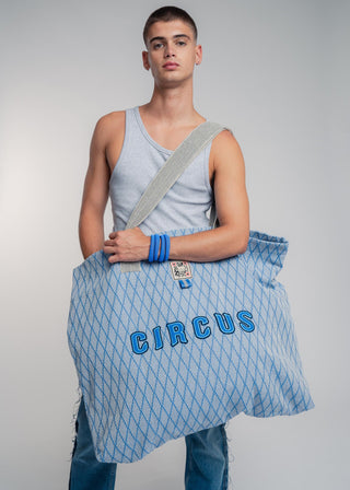 Oversized blue colored carryall made from durable all natural 4 ply cotton. Perfect for everyday shopping or weekend getaways this bag will help you organize everything.