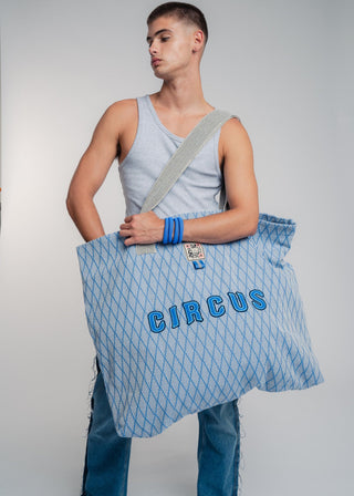 Oversized blue colored carryall made from durable all natural 4 ply cotton. Perfect for everyday shopping or weekend getaways this bag will help you organize everything.