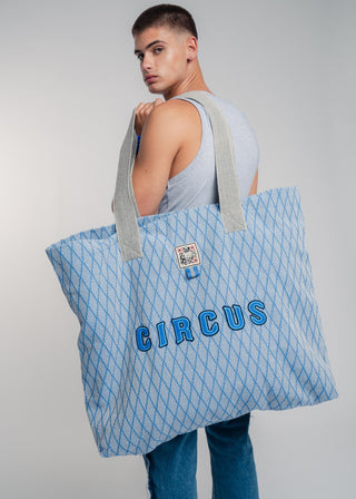 Oversized blue colored carryall made from durable all natural 4 ply cotton. Perfect for everyday shopping or weekend getaways this bag will help you organize everything.