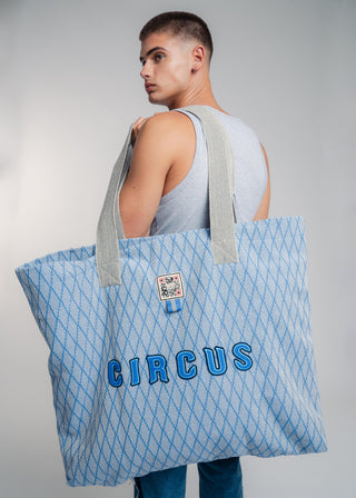 Oversized blue colored carryall made from durable all natural 4 ply cotton. Perfect for everyday shopping or weekend getaways this bag will help you organize everything.
