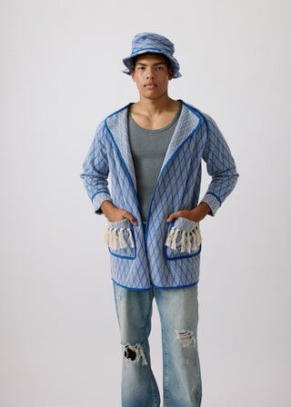 Unisex artist jacket in premium cotton with a bold blue diamond design and blue finished edges.
