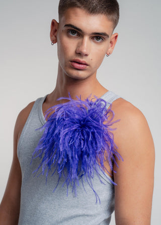 Unisex ostrich feather brooch accessory with a bold dark purple design.
