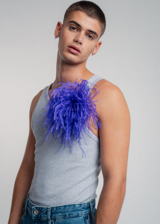 Unisex ostrich feather brooch accessory with a bold dark purple design.