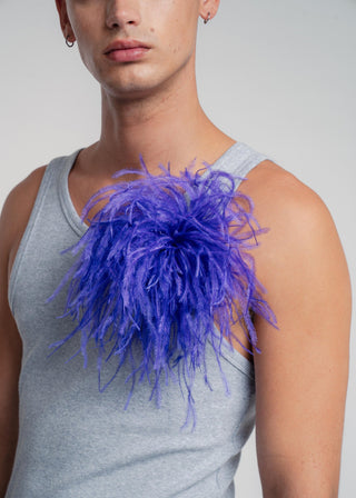 Unisex ostrich feather brooch accessory with a bold dark purple design.